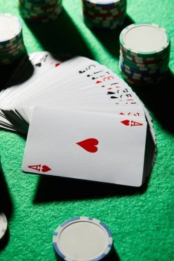 Teen Patti hand ranking chart displayed on a dealer table